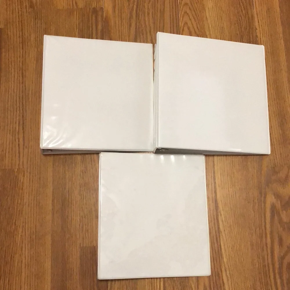 Lot of 3 white 3 ring binders